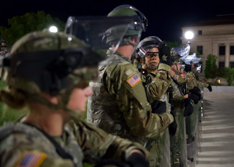 Minnesota National Guard Soldiers and Airmen stand guard overnight