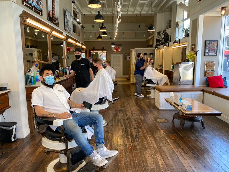 Lead Barber, Juan Sosa, at People's Barber on Polk Street, San Francisco. June 16, 2021.