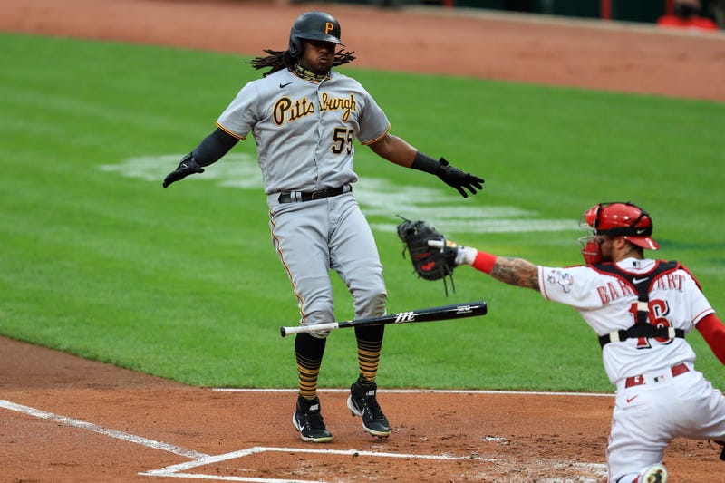 Pittsburgh Pirates' Josh Bell (55) reacts to drawing a walk