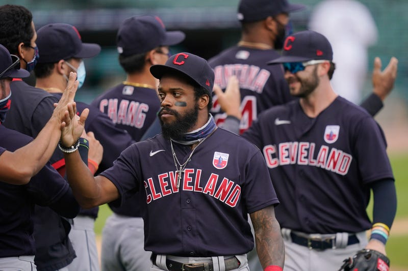 Cleveland Indians center fielder Delino DeShields greets teammates after their 8-5 over the Detroit Tigers in a baseball game, Sunday, Aug. 16, 2020, in Detroit