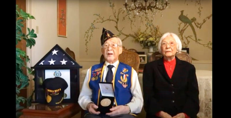 In this image from House Television video, Staff Sgt. Lewis Woo Yee of Houston, accepts a Congressional Gold Medal