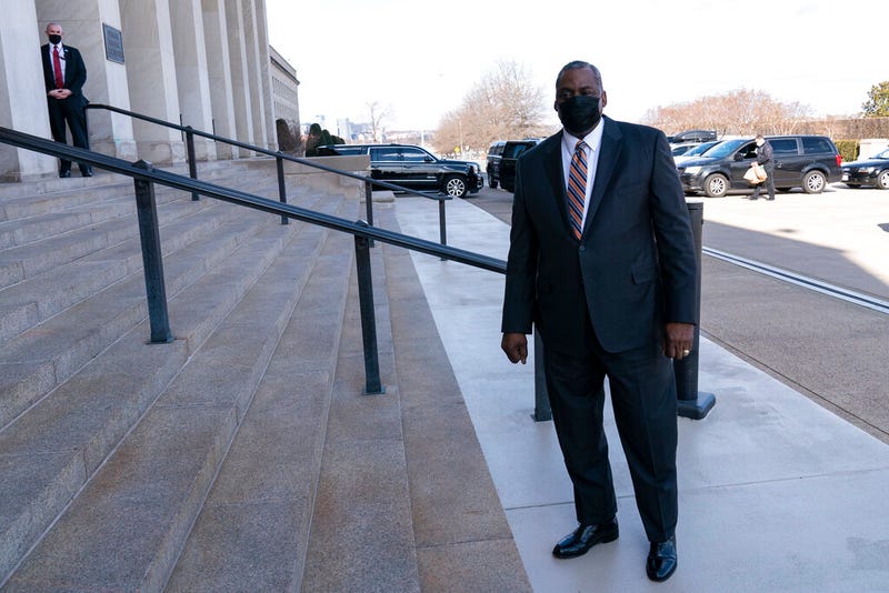 Defense Secretary Lloyd Austin arrives at the Pentagon, Friday, Jan. 22, 2021, in Washington. (AP Photo/Alex Brandon)