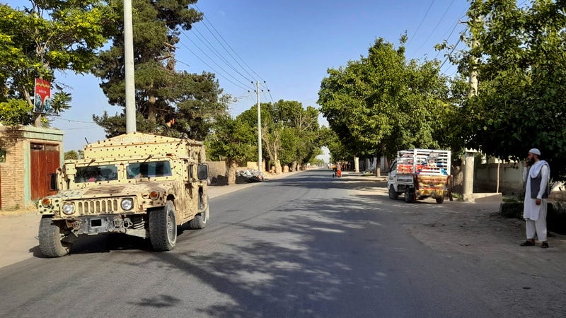 Taliban take key Afghan district, adding to string of gains