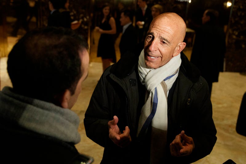 FILE - This photo from Tuesday Jan. 10, 2017, shows Tom Barrack peaking with reporters in the lobby of Trump Tower in New York before meeting with President-elect Donald Trump. Barrack, chair of former President Donald Trump's 2017 inaugural committee, was arrested Tuesday, July 20, 2021, in California on charges alleging that he and others conspired to influence Trump's foreign policy positions to benefit the United Arab Emirates. (AP Photo/Evan Vucci, File)
