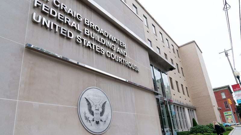 FBI: Cash, shredded papers seen at Navy couple's home in sub spy case