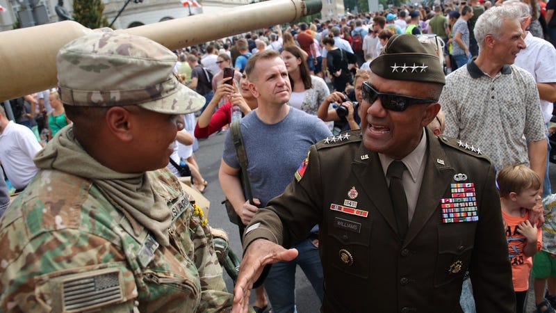 With war nearby, US shows support for Poland on army holiday