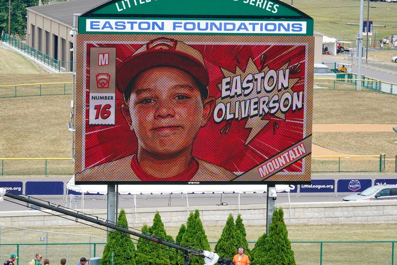 An image of Mountain Region Champion Little League team member Easton Oliverson is displayed on the scoreboard at Volunteer Stadium during the opening ceremony of the 2022 Little League World Series baseball tournament in South Williamsport, Pa., on Aug 17, 2022.