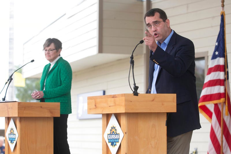 Kansas Attorney General Derek Schmidt speaks during a debate with Gov. Laura Kelly