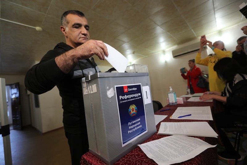 Occupied Ukraine holds Kremlin-staged vote on joining Russia
