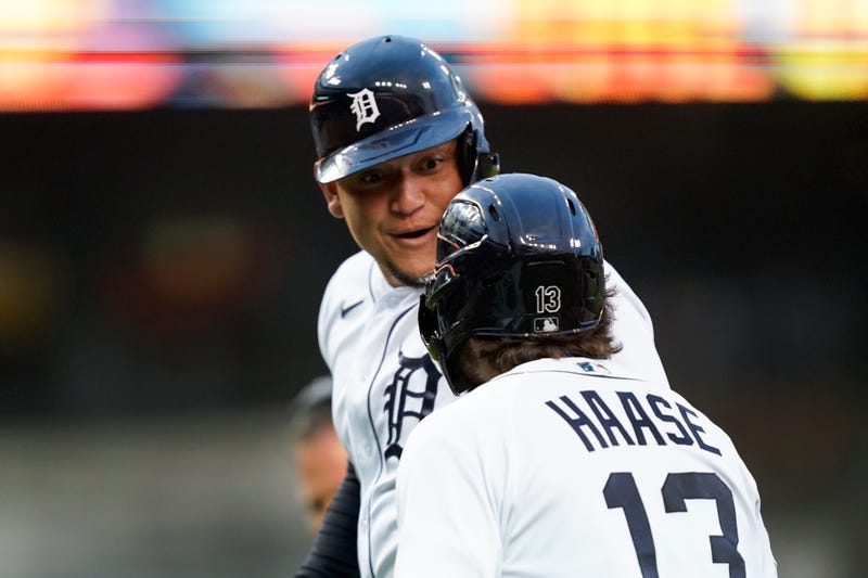 Detroit Tigers' Miguel Cabrera celebrates with Eric Haase (13) after hitting a two-run home run against the Kansas City Royals