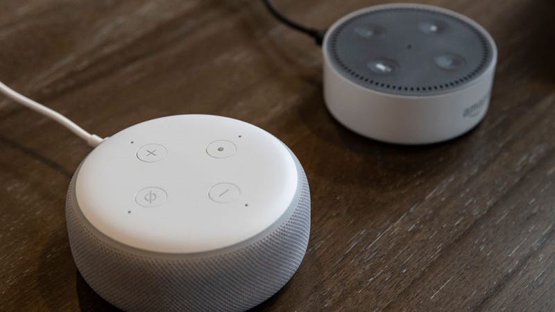 An updated "Echo Dot" (L) is pictured next to an older generation "Echo Dot" at Amazon Headquarters, on September 20, 2018 in Seattle Washington.