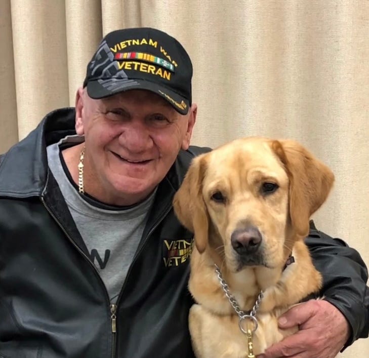 Navy veteran, Salvatore Argano, receives service dog named Sylvie from nonprofit