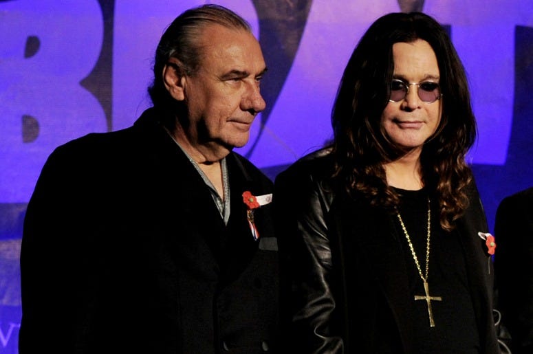 Bill Ward and Ozzy Osbourne at a press conference in 2011