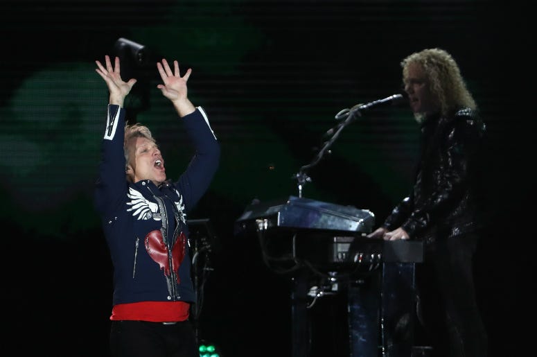 Jon Bon Jovi and David Bryan perform during the Bon Jovi This House Is Not For Sale Tour 2108 at Melbourne Cricket Ground