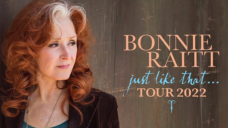 Bonnie Raitt against wood background and tour text