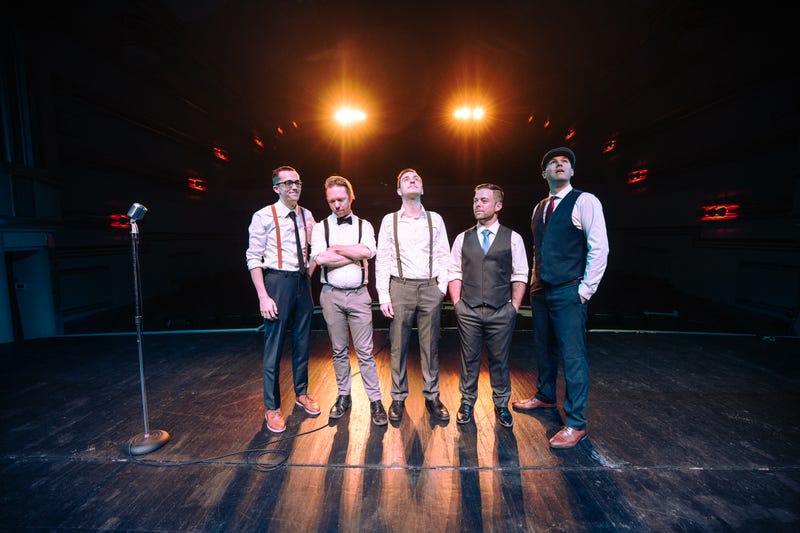 Pike's band Low Standards poses on stage
