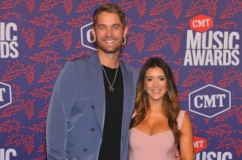 Brett Young and Taylor Mills attend the 2019 CMT Music Awards
