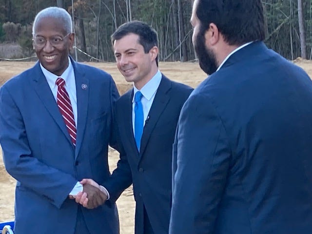Transportation Secretary Pete Buttigieg (in blue tie) with Congressman Donald McEachin