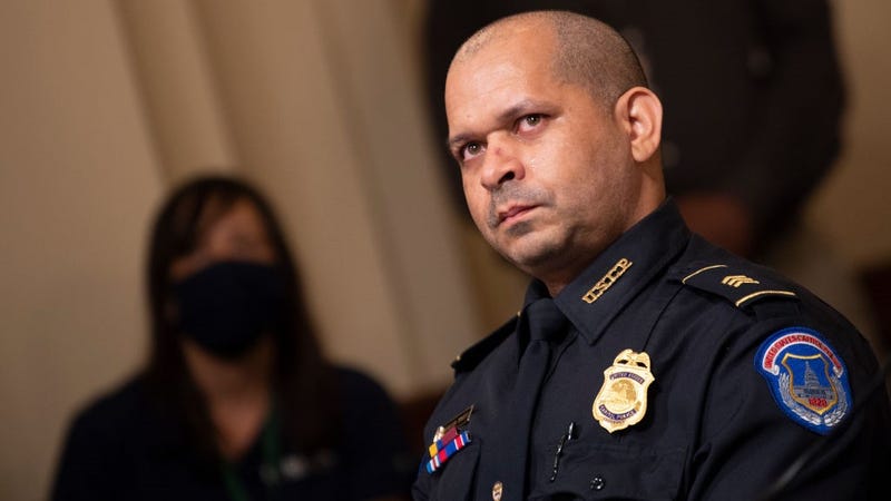 Aquilino Gonell, sergeant of the U.S. Capitol Police, watches a video of rioters during a hearing of the House select committee investigating the January 6 attack on the U.S. Capitol on July 27, 2021 at the Cannon House Office Building in Washington, DC.