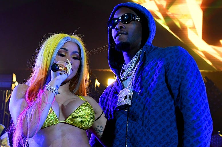 Offset and Cardi B perform