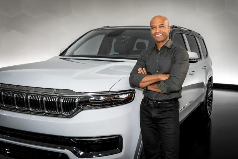 Stellantis Chief Design Officer Ralph Gilles next to Jeep Wagoneer