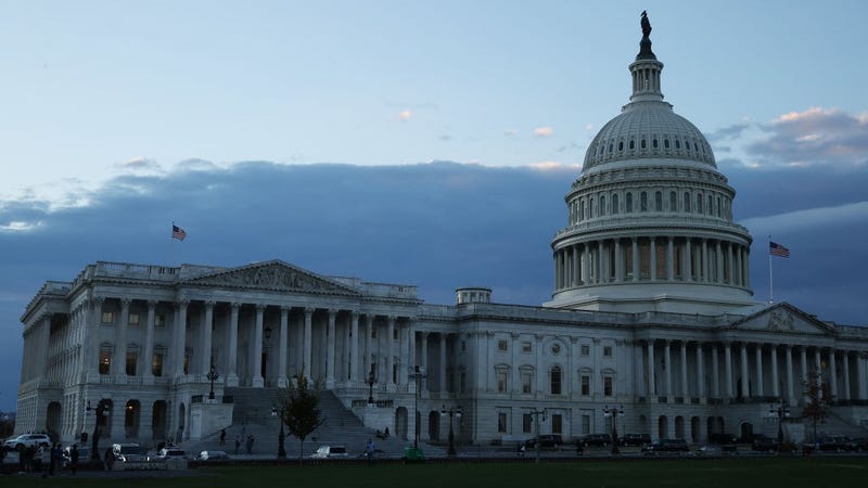 The sun sets behind the U.S. Capitol on November 18, 2021 in Washington, DC