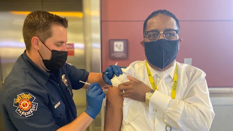 A man receives his coronavirus vaccination at McCarran International Airport in Las Vegas, NV.