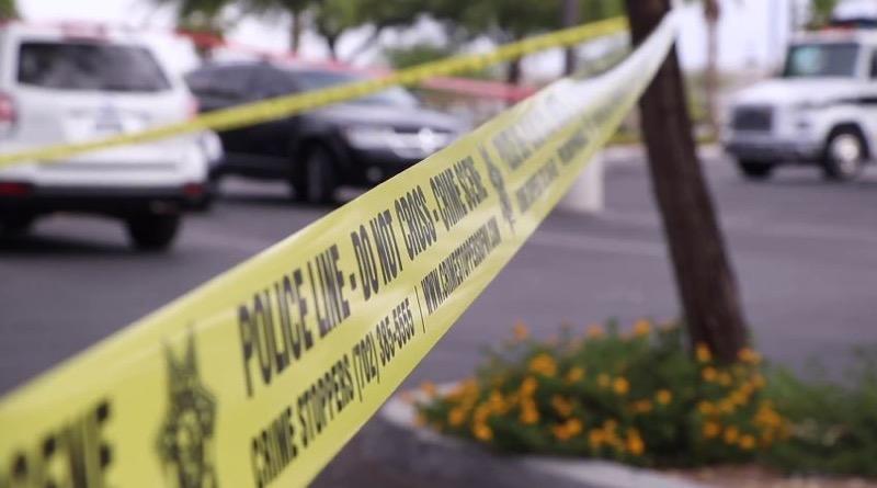 Yellow crime scene tape roping off a police investigation