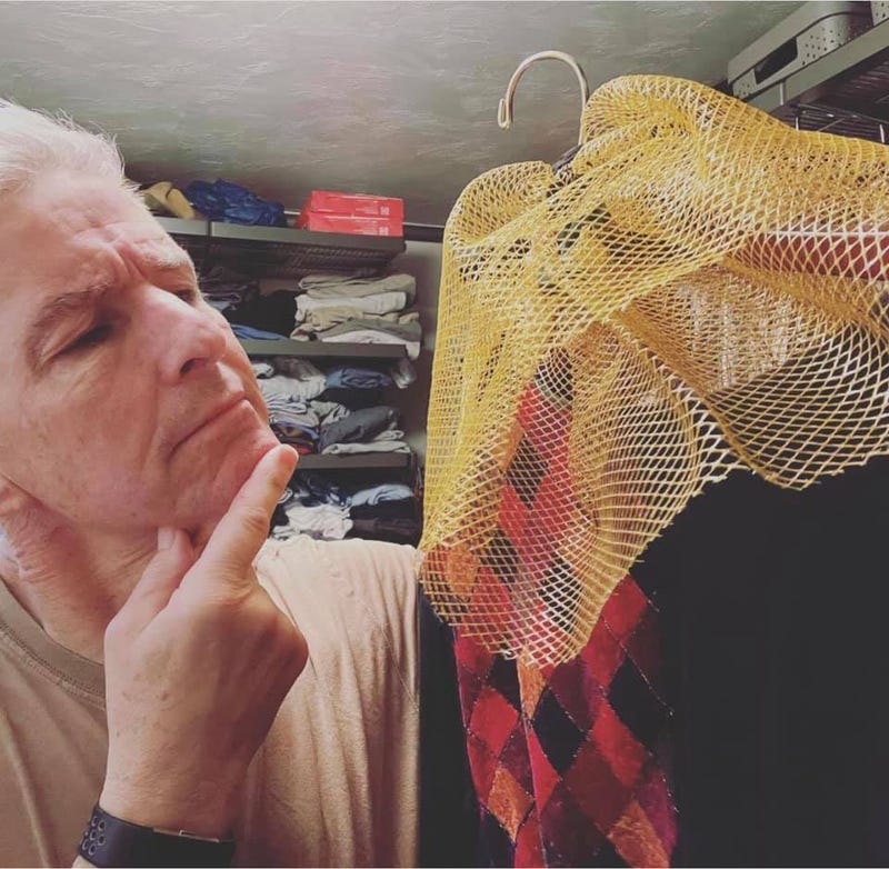 David in his closet with a jester costume