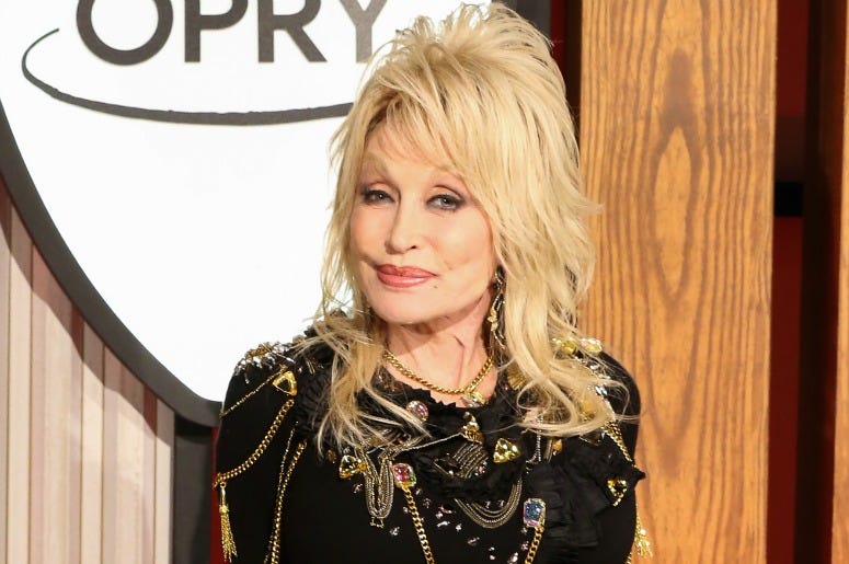 Dolly Parton attends a press conference before a performance celebrating her 50-year anniversary with the Grand Ole Opry