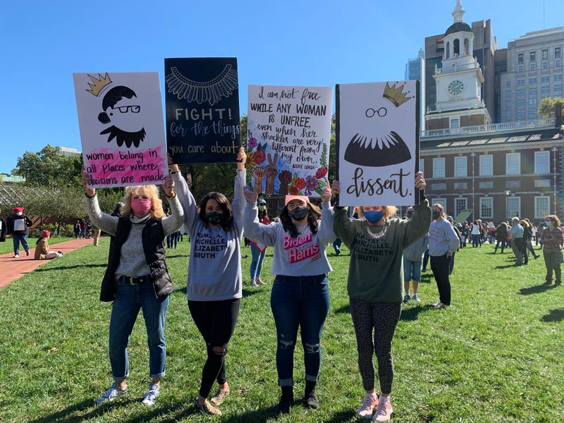 A group of women take part in Saturday's Women's March from Old City to the Benjamin Franklin Parkway.