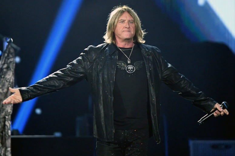 Joe Elliott of of Def Leppard performs onstage