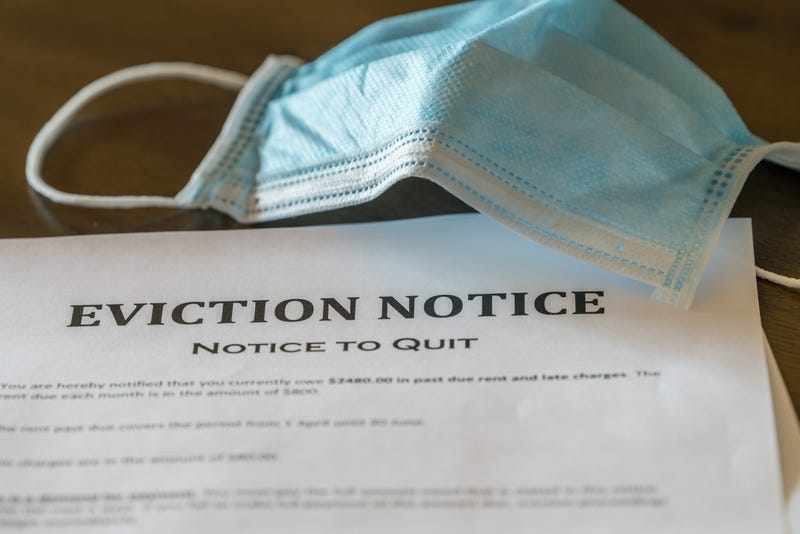 An eviction notice is served during the coronavirus pandemic