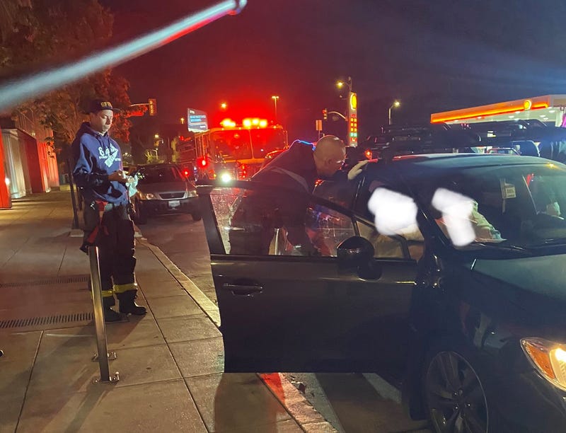 San Francisco police and firefighters sprang to action Friday night to assist a woman giving birth in a parked car.