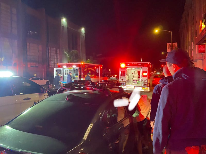 The city officials teamed up to deliver twins in the back of the car.