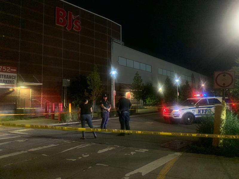 Police were investigating at the BJ's parking garage into the morning on Friday after a 19-year-old man was fatally shot there