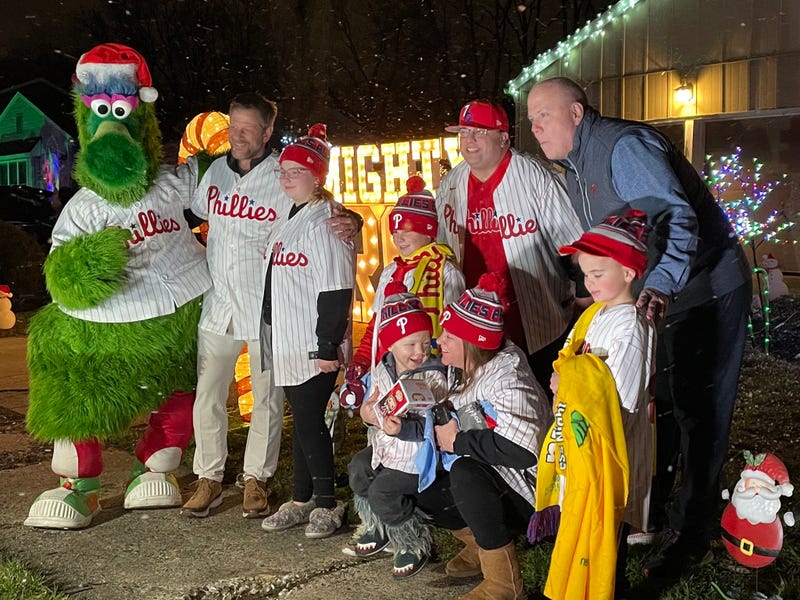 Aaron Kline and his family gather for a picture with the Philly Phanatic and Phillies TV voice Tom McCarthy, on a special night for the 4-year-old boy from Mount Laurel who is battling a recently-removed brain tumor.