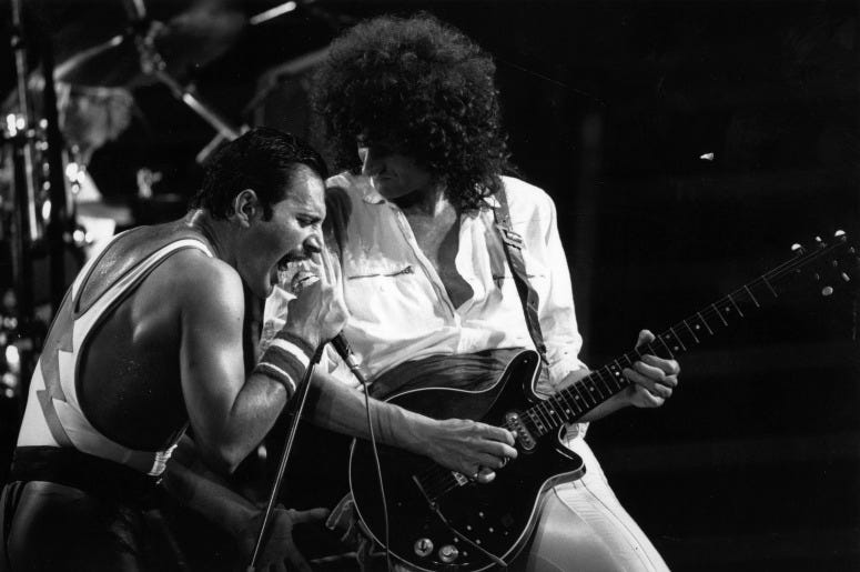 Queen in concert with singer Freddie Mercury