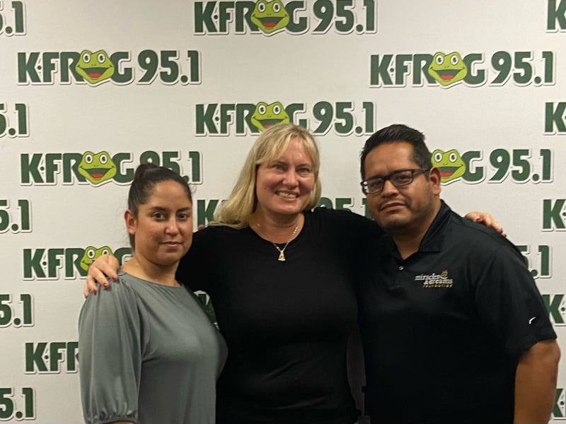 Miracles and Dreams Foundation's Liza Sosa and Joe Ramos with K-Frog's Pepper