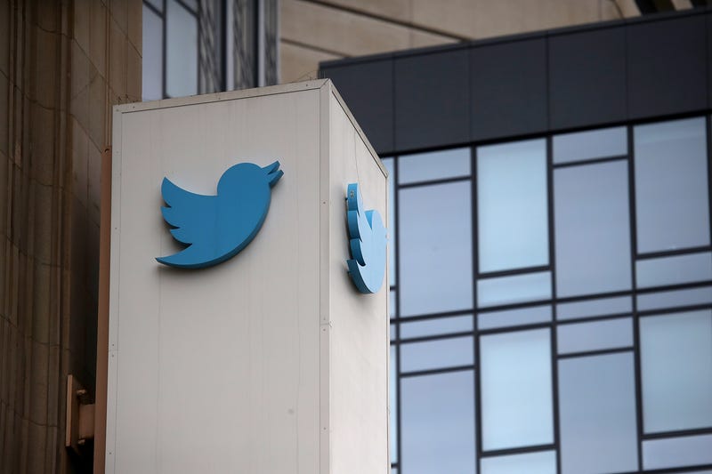 A sign is posted on the exterior of Twitter headquarters in San Francisco.