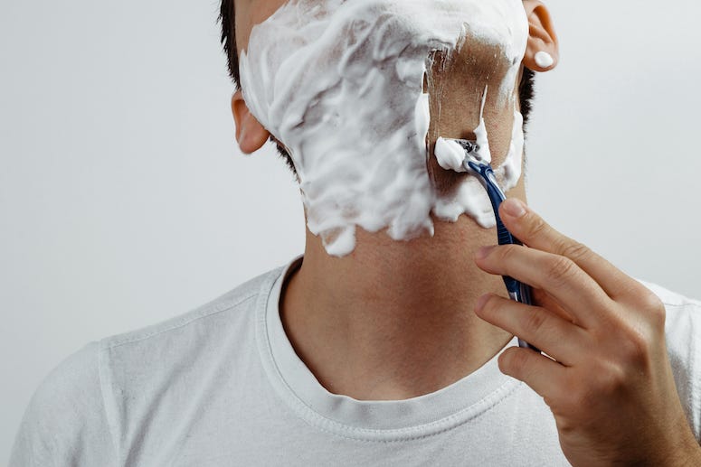 Man Shaving Face