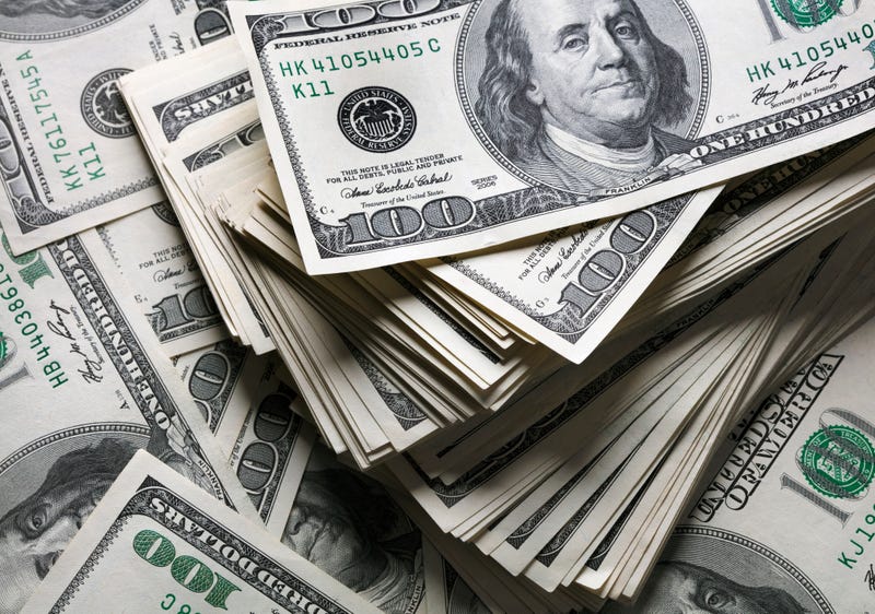 stack of one hundred dollar bills