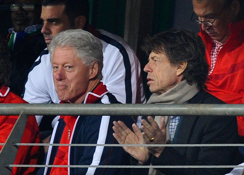 mick jagger and bill clinton watch world cup soccer