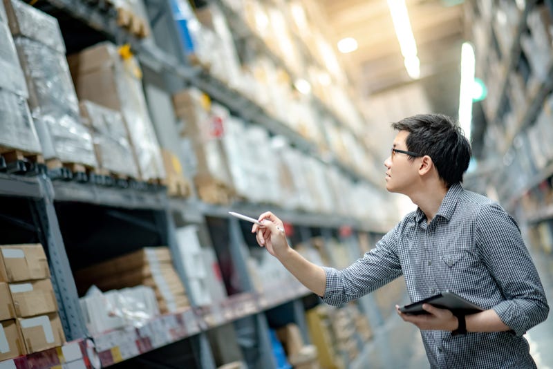 man counts inventory