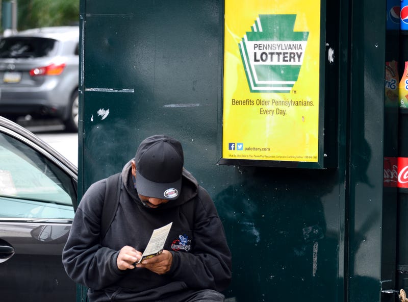 Man checks lotto ticket