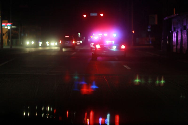 MIAMI - AUGUST 11: A City of Miami police car with lights ablaze responds to a call as they patrol the street on August 11, 2010 in Miami, Florida. The Miami Police Department launched "Operation Take Back Our Streets" yesterday in response to recent shootings in the Model City and Little Haiti communities of Miami. The city has seen a number of shootings recently using high powered assault weapons.
