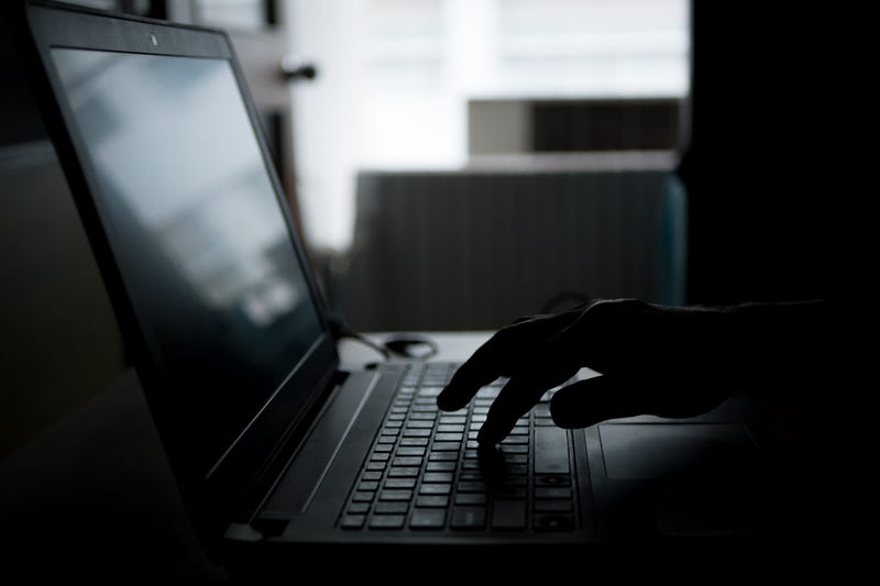 Woman typing on laptop