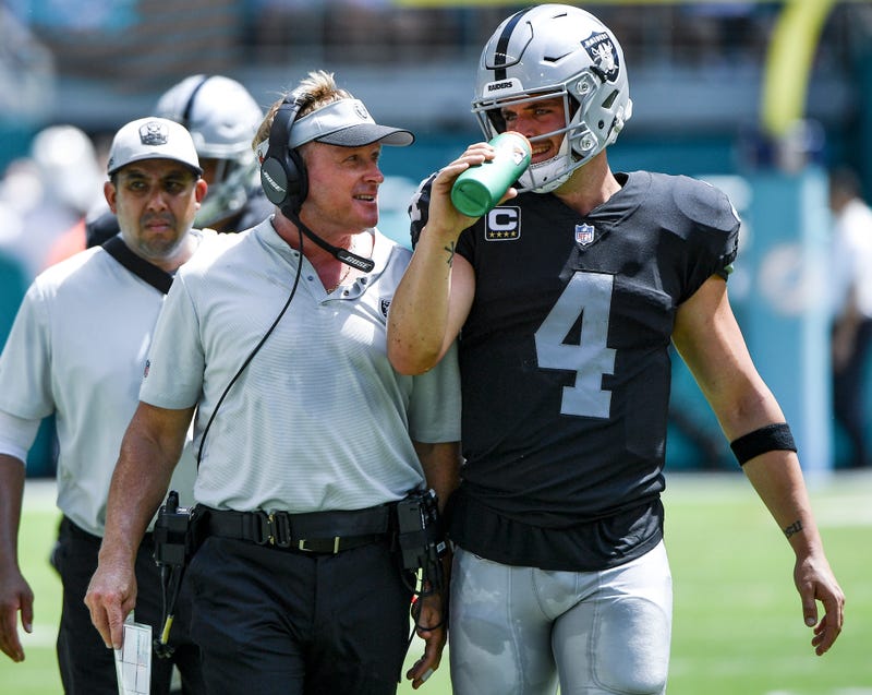 Jon Gruden and Derek Carr