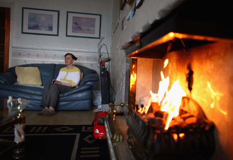 Woman sitting on couch