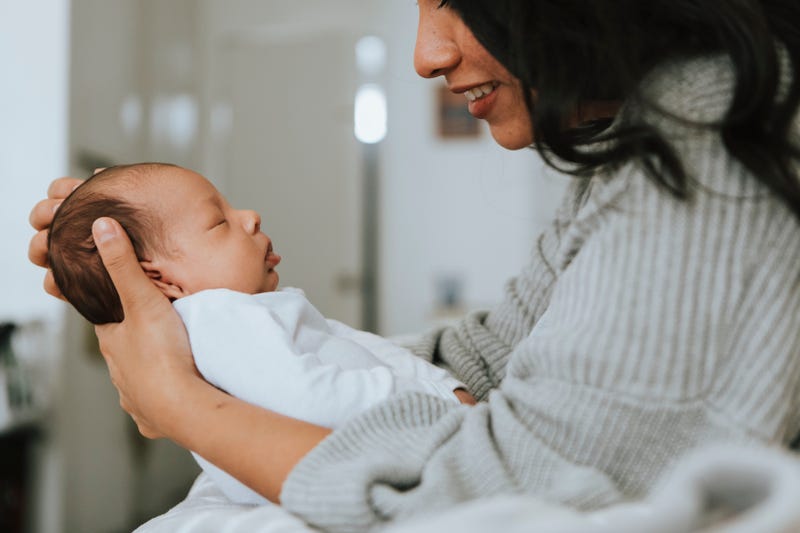 mother holding her baby